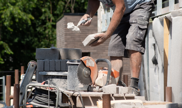 Concrete block wall construction for a hardscape project in Calgary