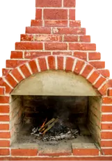 Brick masonry outdoor fireplace built by DMG Masonry in Calgary